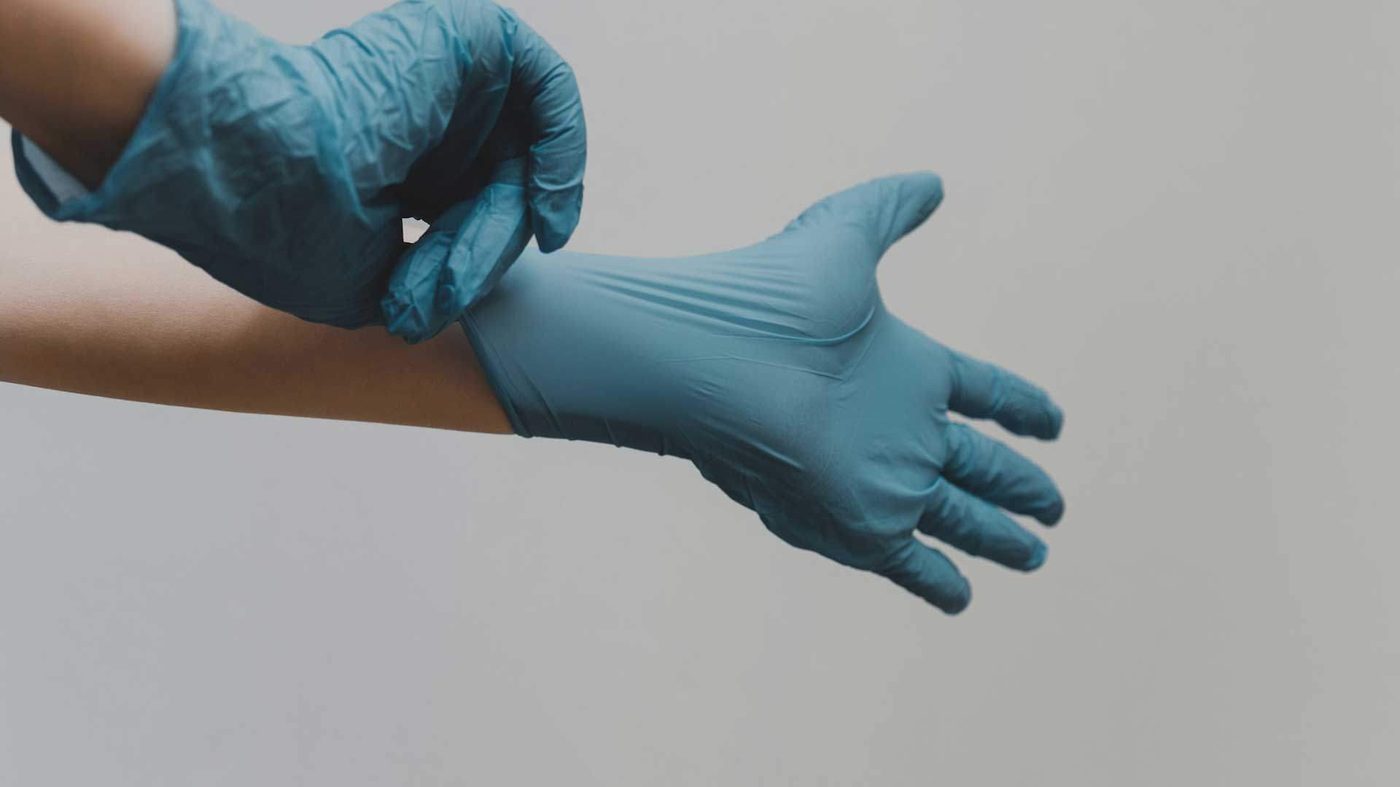 Gloved up for a sanitation job, Lagos
