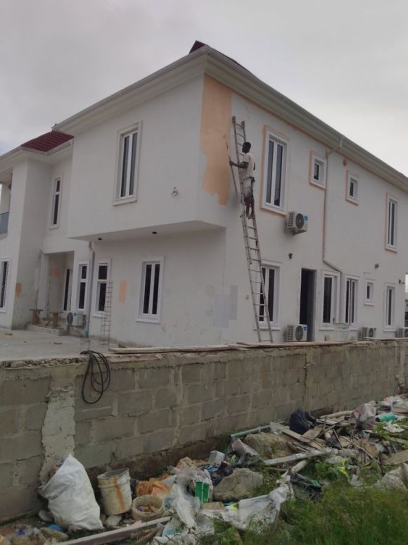 Exterior painting in progress, Benin City