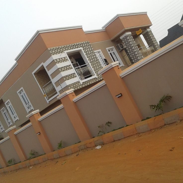 Terracotta boundary wall and gatehouse, Asaba